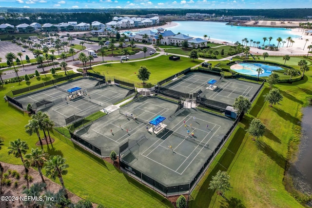 bird's eye view with a water view