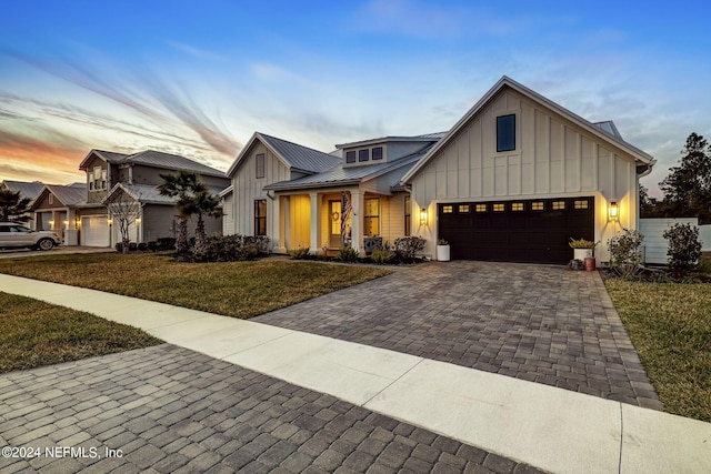 modern farmhouse featuring a lawn