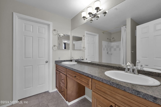 bathroom with vanity, tile patterned flooring, and a shower with shower curtain