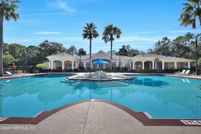 view of swimming pool featuring a patio