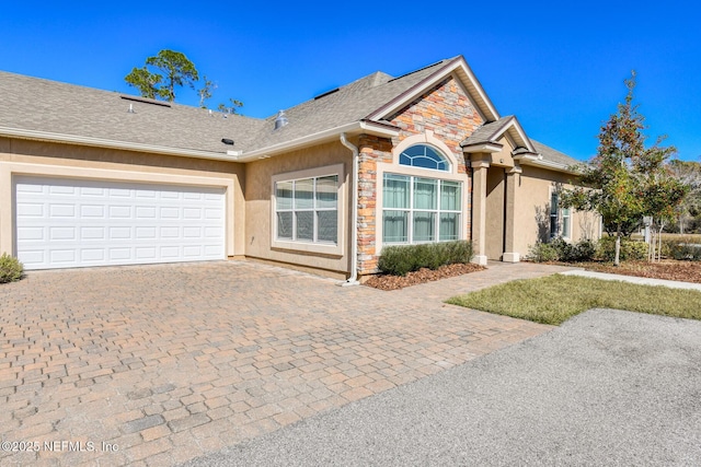 ranch-style house with a garage