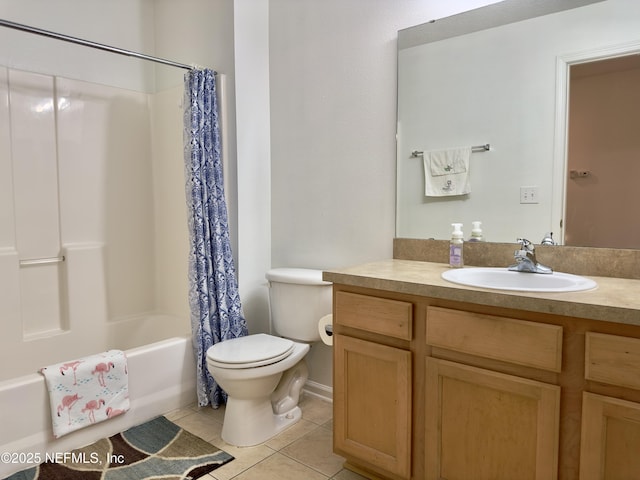 full bathroom featuring tile patterned floors, toilet, shower / bath combo with shower curtain, and vanity