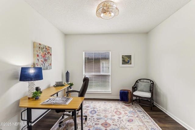 office featuring hardwood / wood-style floors and a textured ceiling