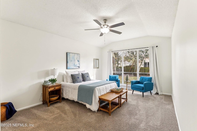 carpeted bedroom featuring vaulted ceiling, ceiling fan, and a textured ceiling