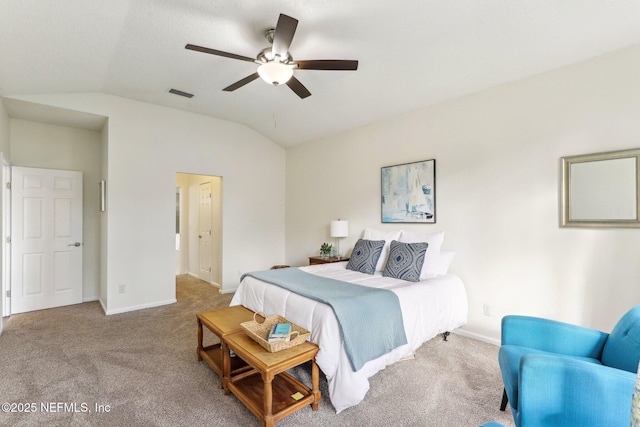 carpeted bedroom featuring vaulted ceiling and ceiling fan