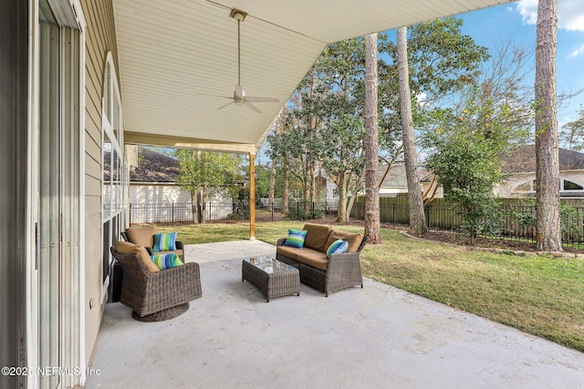 view of patio / terrace with an outdoor living space and ceiling fan