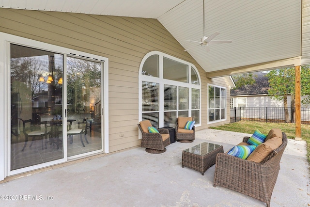 view of patio with an outdoor living space and ceiling fan