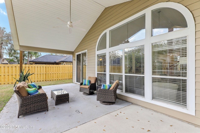 view of patio / terrace with an outdoor living space and ceiling fan