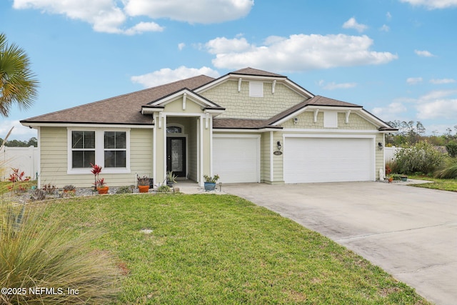 view of front of house featuring concrete driveway, fence, a front yard, and a shingled roof