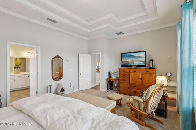 bedroom with visible vents, crown molding, ensuite bathroom, a raised ceiling, and light colored carpet