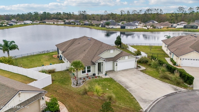 bird's eye view featuring a residential view and a water view