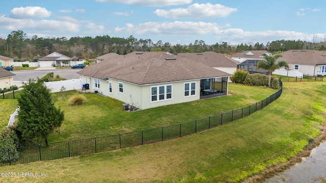 birds eye view of property with a residential view