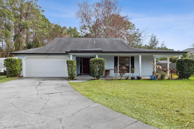 single story home featuring a garage, a front yard, and covered porch