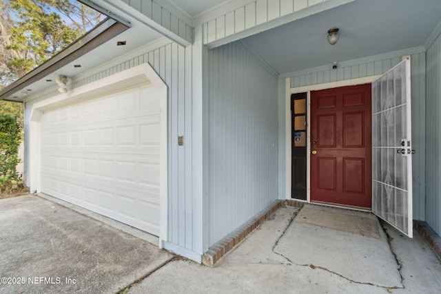 property entrance featuring a garage