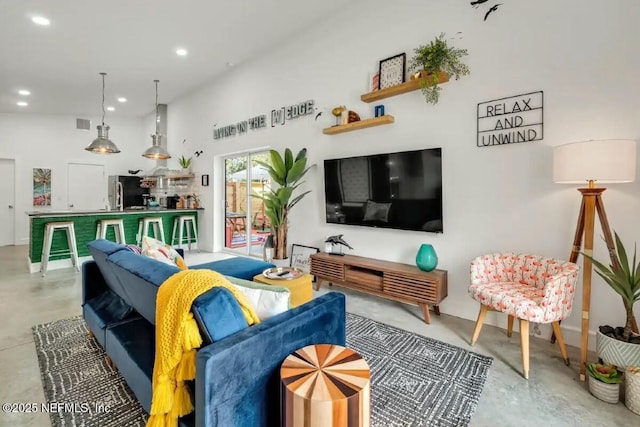 living room featuring concrete floors