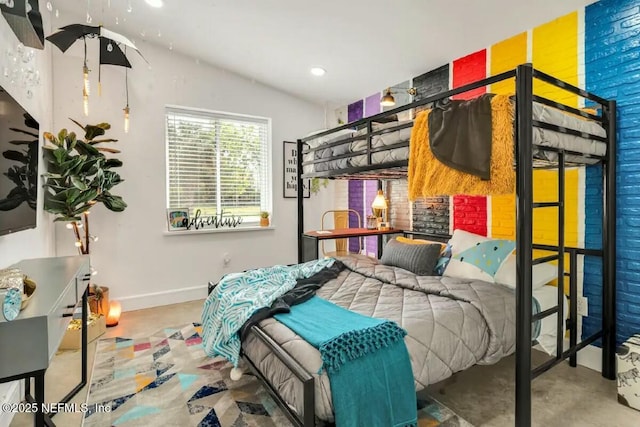 bedroom featuring concrete flooring