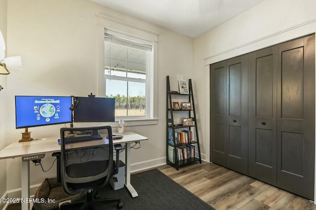 office space featuring light hardwood / wood-style floors