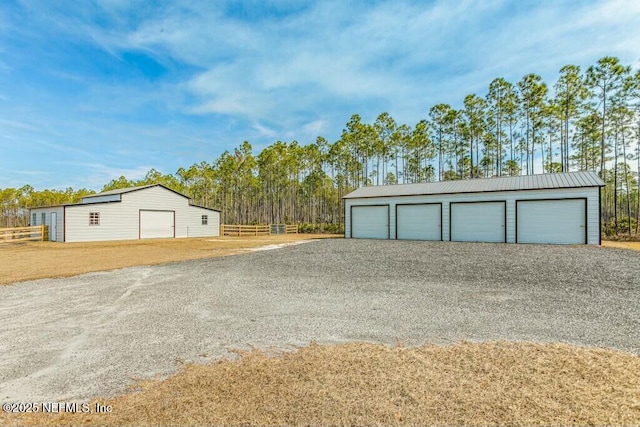 garage with a yard