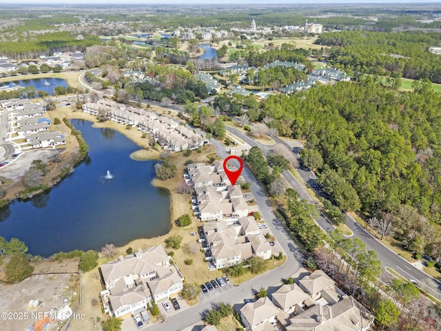 bird's eye view featuring a water view and a residential view