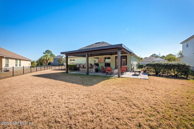 back of property featuring a patio