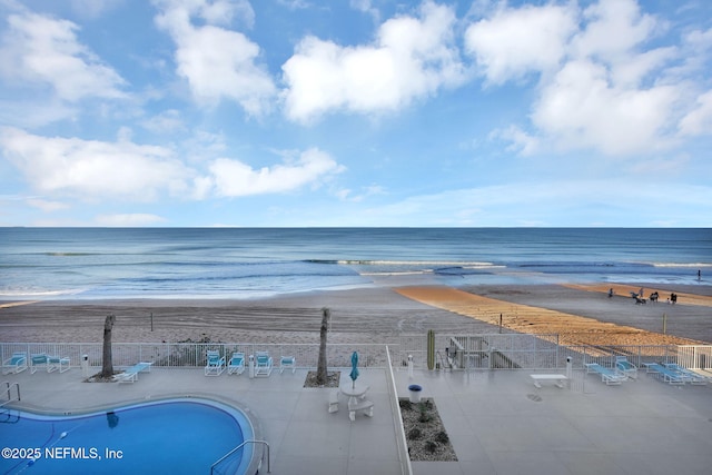 property view of water featuring a beach view