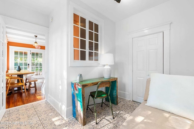 office featuring light tile patterned floors and french doors