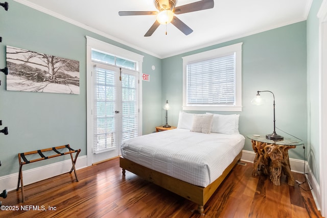 bedroom with dark wood-type flooring, ceiling fan, crown molding, and access to outside