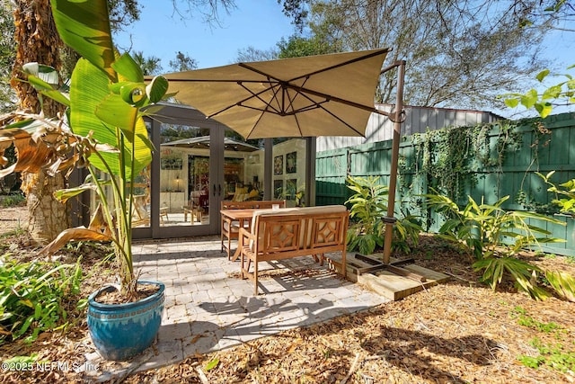 view of patio featuring french doors