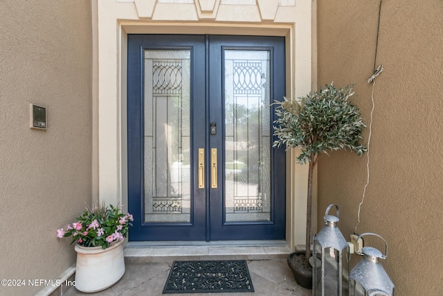 view of exterior entry with french doors