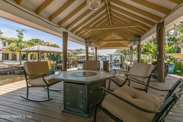 deck with a gazebo and a dock