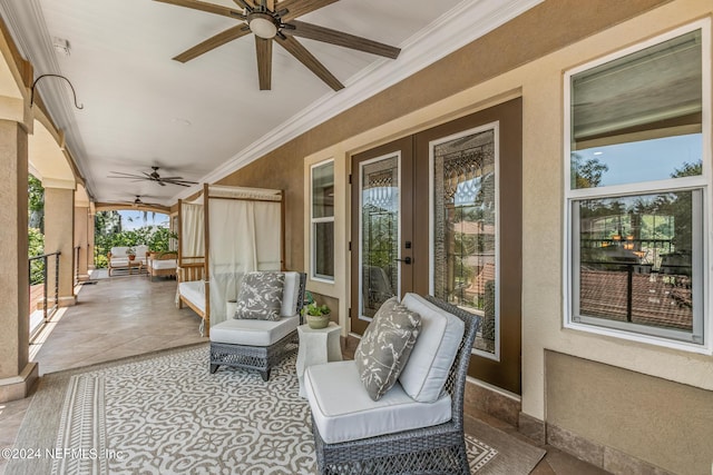 sunroom with french doors and ceiling fan