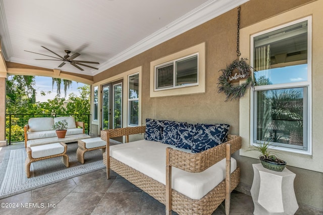 view of patio with outdoor lounge area and ceiling fan