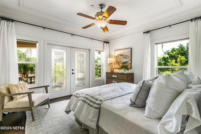 bedroom with crown molding, ceiling fan, access to exterior, and french doors