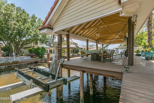 dock area featuring a water view