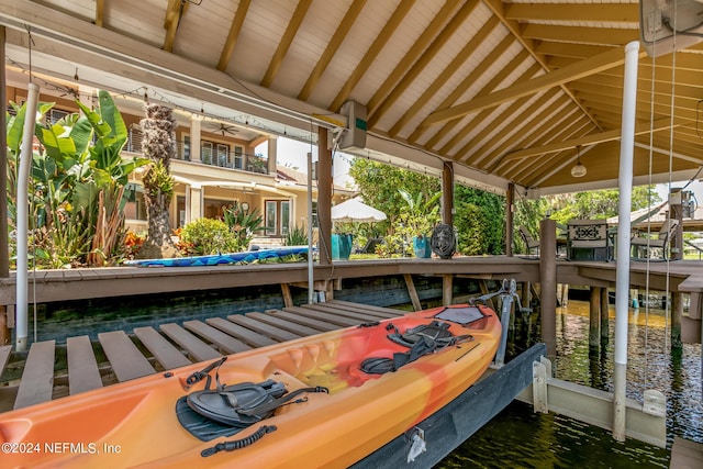 dock area with a water view