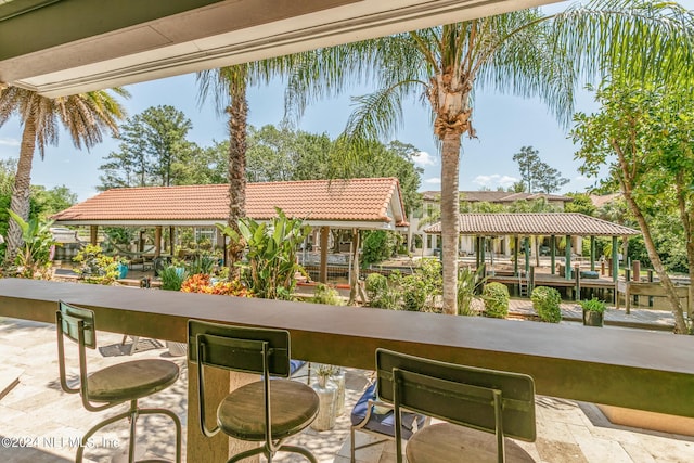 exterior space with an outdoor bar