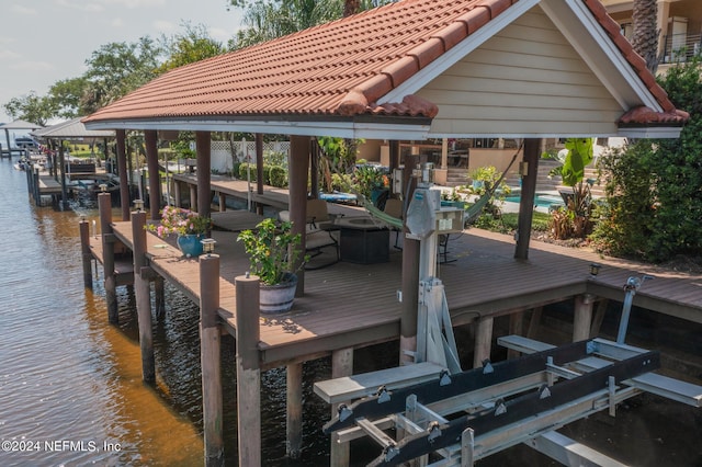 view of dock with a water view