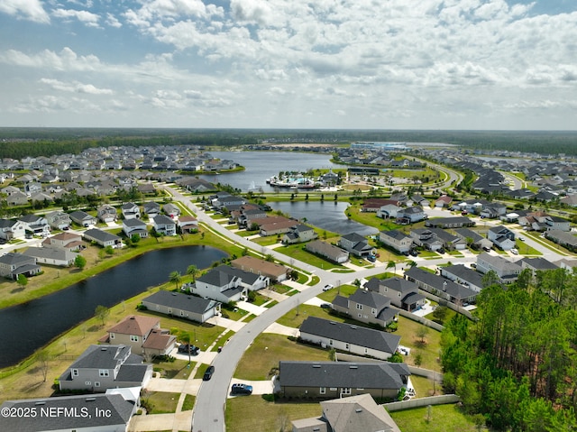 aerial view featuring a residential view and a water view