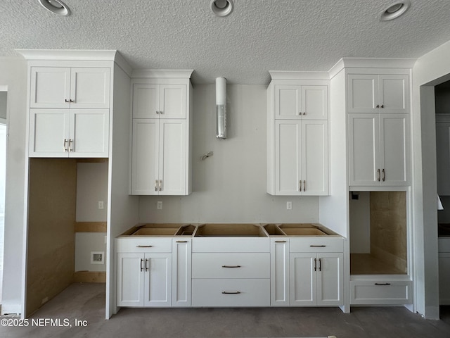 kitchen with white cabinetry