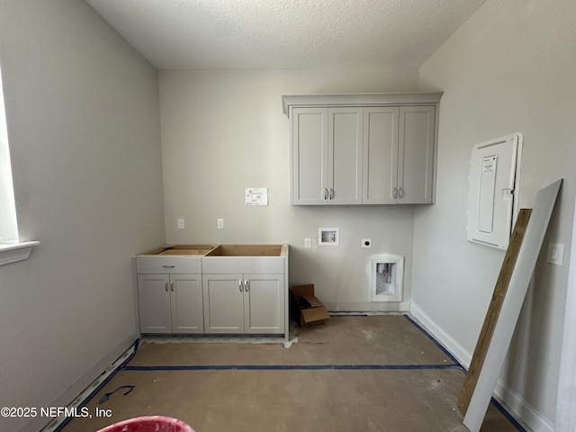 clothes washing area with a textured ceiling, hookup for a washing machine, hookup for an electric dryer, cabinet space, and electric panel