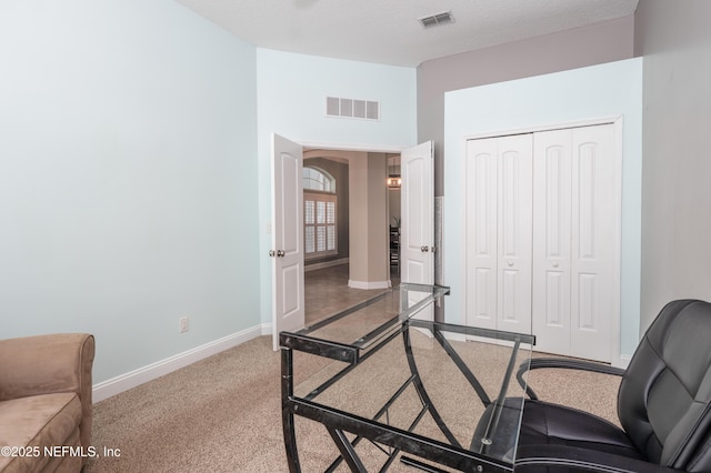 office featuring vaulted ceiling and carpet floors