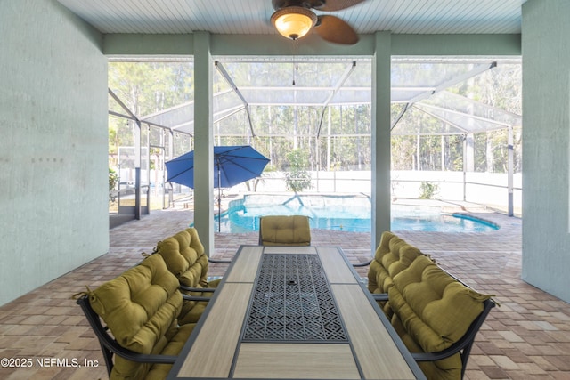 view of swimming pool with ceiling fan