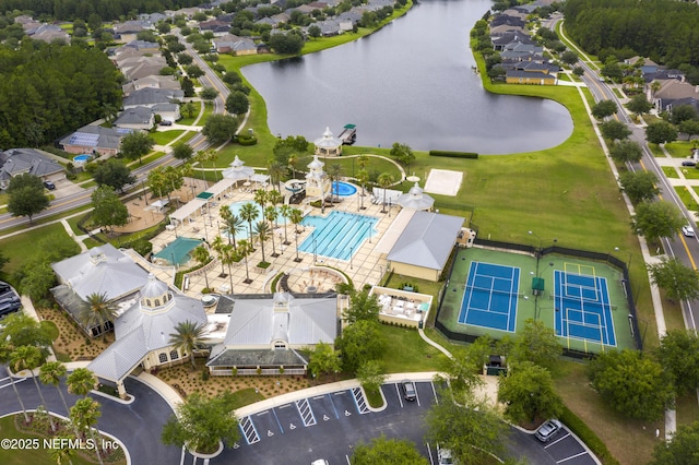 drone / aerial view with a water view