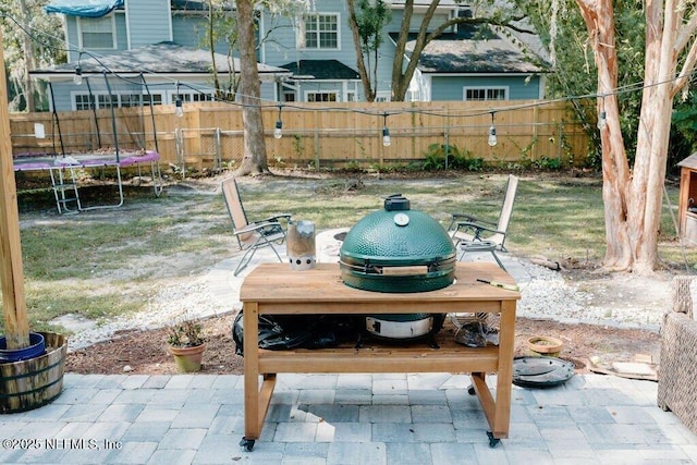 view of patio with a trampoline