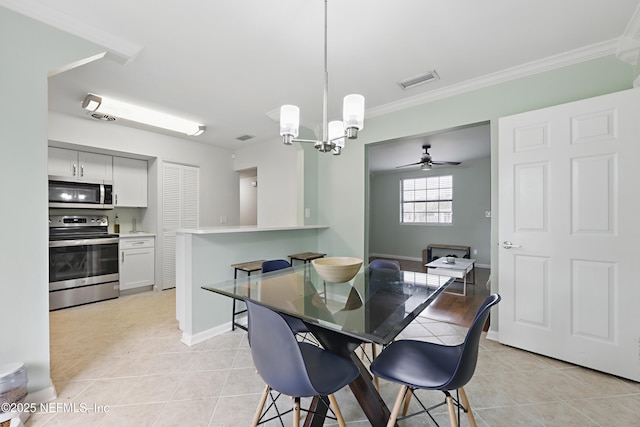 dining area featuring ornamental molding, light tile patterned flooring, and ceiling fan with notable chandelier