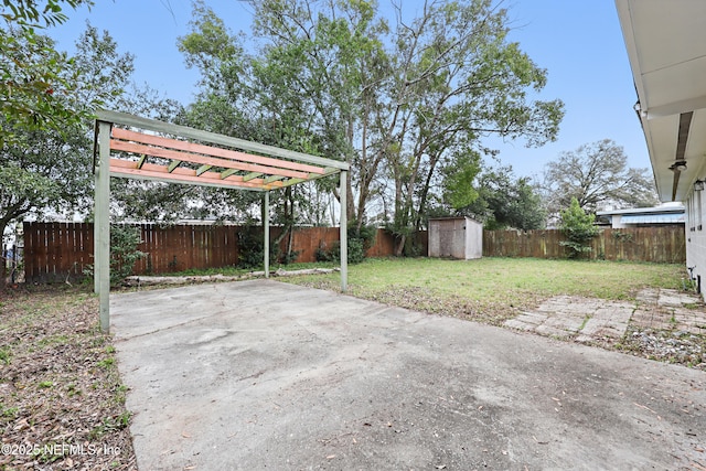 view of patio / terrace featuring a shed and a pergola