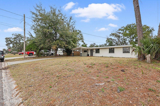 exterior space featuring a carport