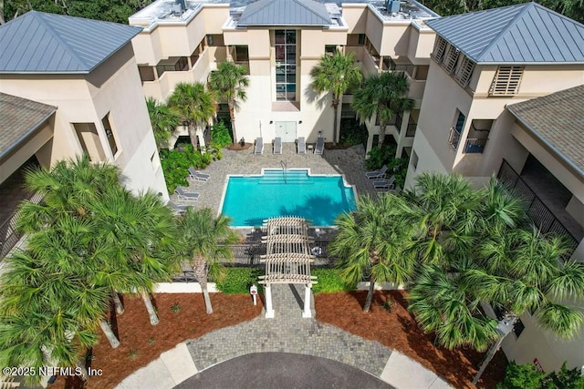 view of swimming pool featuring a patio