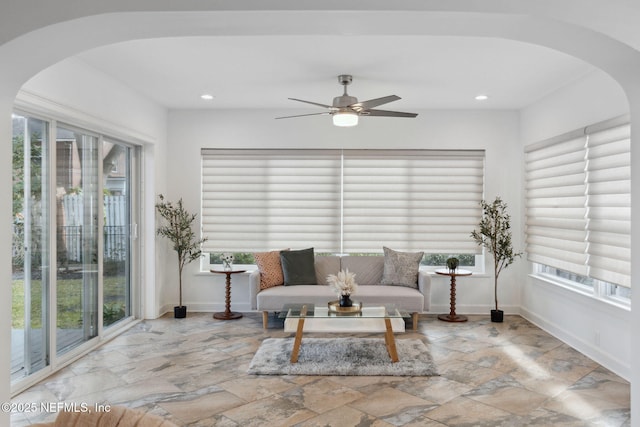 living room with ceiling fan