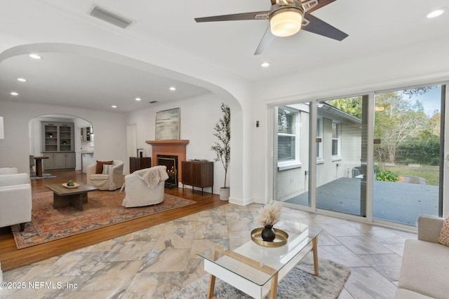 living room with ceiling fan